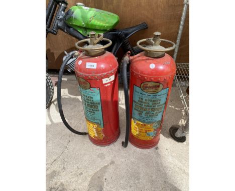 TWO VINTAGE CONQUEST FIRE EXTINGUISHERS 