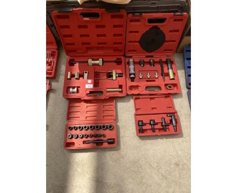 AN ASSORTMENT OF CASED TOOLS TO INCLUDE A MASTER WHEEL LOCK REMOVING KIT AND AN INJECTOR PULLER REMOVAL KIT ETC 