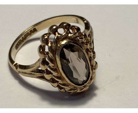 A 9 CARAT GOLD RING WITH AN OVAL SOLITAIRE STONE SIZE K GROSS WEIGHT 2.58 GRAMS 