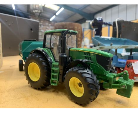 AN ERTL BRITAINS JOHN DEERE TRACTOR 8191 WITH A KEENAN SYSTEM MUCK SPREADER 