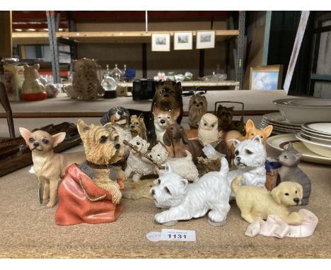 A COLLECTION OF DOG FIGURES 