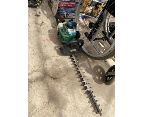 A PETROL ENGINE HEDGE TRIMMER 
