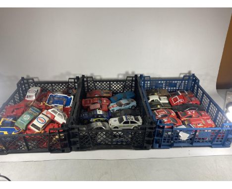 TWO BOXES OF SCALEXTRIC CARS TOGETHER WITH A FURTHER BOX OF SCALEXTRIC MINI METRO SPARES 