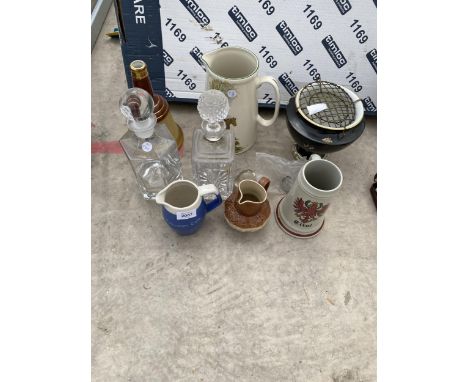 AN ASSORTMENT OF ITEMS TO INCLUDE GLASS DECANTORS AND CERAMIC JUGS ETC 
