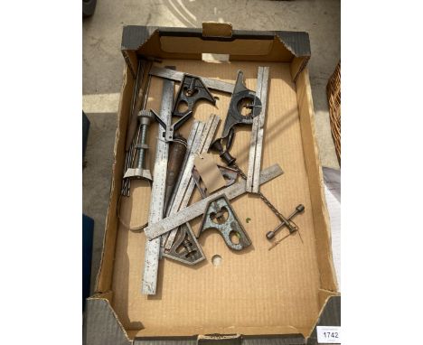 AN ASSORTMENT OF ENGINEERS TOOLS TO INCLUDE SET SQUARES ETC 