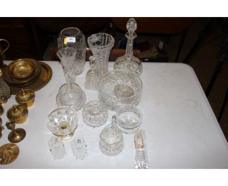 A quantity of various cut and other glassware to include decanter and stopper; vases; a fruit bowl; a glass bell etc.