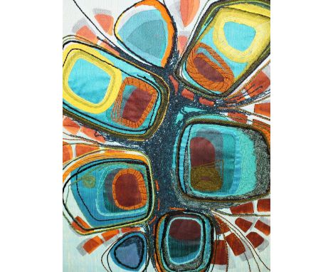 A framed abstract tapestry 