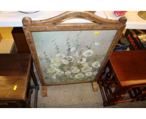 An oak firescreen inset with an oil painting dated 1912