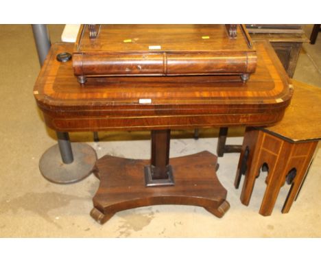 A Regency rosewood and satinwood cross banded and brass strung card table 