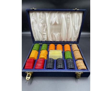 A cased vintage set of gaming chips or markers by Cheney