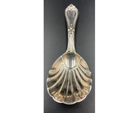 A silver caddy spoon, hallmarked for London 