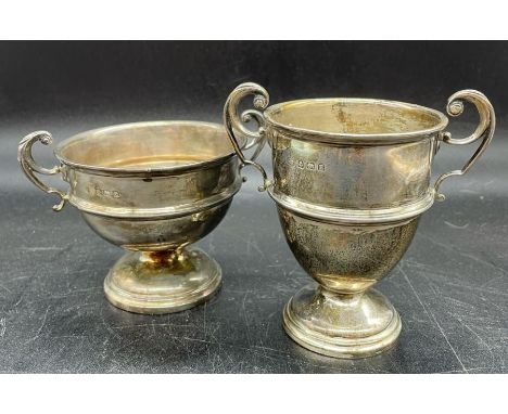 //Two silver handled cups by Alexander Clark &amp; Co Ltd (170g) Birmingham 1929 