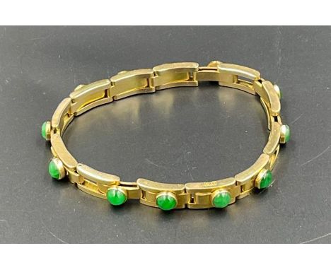 A Chinese 20ct gold and jade bracelet, (Total Weight 27g) by Hung Cheong.