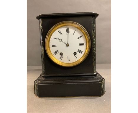 A marble and statue mantle clock stamped A.B 