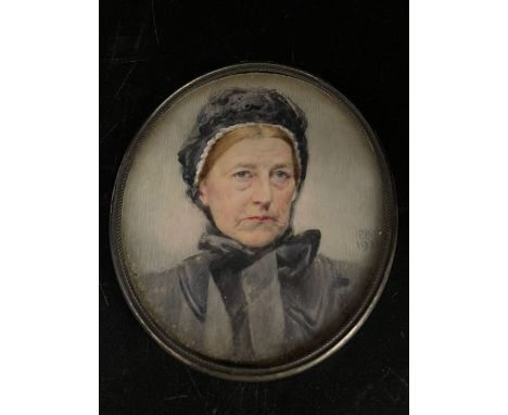 A Miniature portrait of woman with black bonnet by Percy Buckman, signed and dated (Possibly 1928)