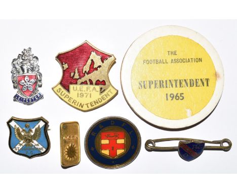 Seven football and sports related badges including enamel UEFA 1971 Superintendent, The Football Association 1965 Superintend