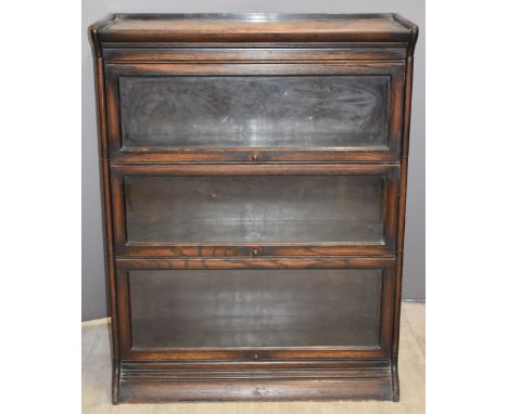 Globe Wernicke style three section oak bookcase with up and over doors W87 x D 33 x H 113cm