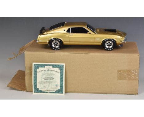 Bradford Exchange diecast model Mustang Boss 429 10K gold plated edition, in original box with certificate of authenticity.&n