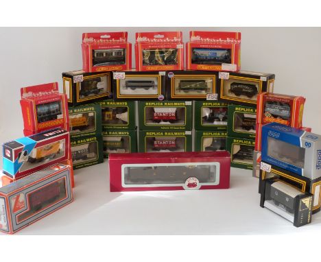 Thirty Hornby, Replica Railways, Dapol, Graham Farish and Lima 00 gauge model railway wagons, vans and tankers, all in origin