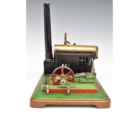 A&nbsp;stationary&nbsp;live steam engine with fixed cylinder, whistle and sight glass