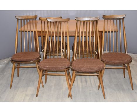 Ercol or similar dining table and six chairs, length 152 x width 88cm
