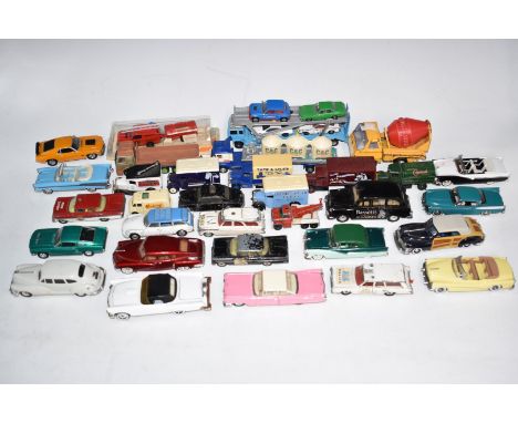 Thirty-two Corgi Toys, Dinky Toys, Matchbox and similar diecast model vehicles including Fire Chief, Police Highway Patrol, C