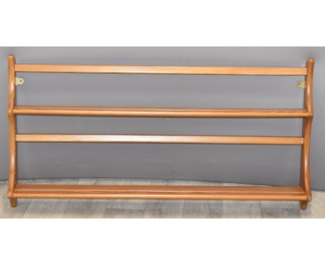 Ercol light elm wall mounted plate rack, width 94cm