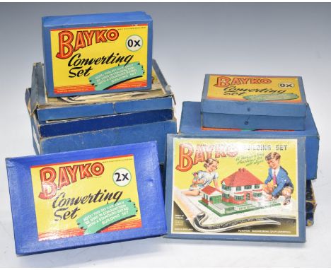 Ten Bayko building sets comprising three 0, 1x, three 2x, two 0x and one other, together with a large quantity of loose parts