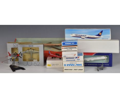 Fourteen Schabak, Matchbox, Dinky Toys and similar model aeroplanes including VEB Plasticart Intercontinental 27520, Concorde