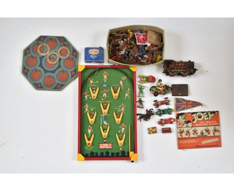 A collection of various toys and games including Floodlit Football bagatelle, quoits, 'Joey' The Amazing Dancing Clown, Hornb