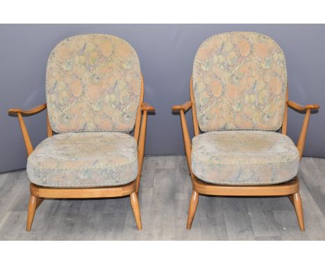 Two Ercol retro/mid century modern light elm stick back armchairs