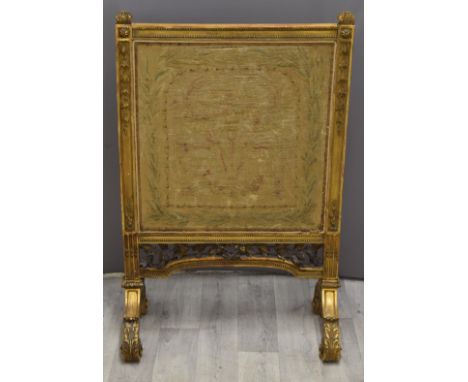 Regency carved gilt framed tapestry/embroidery fire screen raised on scroll feet, width 68 x height 100cm