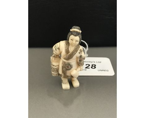 FIRST QUARTER 20THC CARVED IVORY NETSUKE, signed study of a woman holding a rope bound wood bucket and a mallet