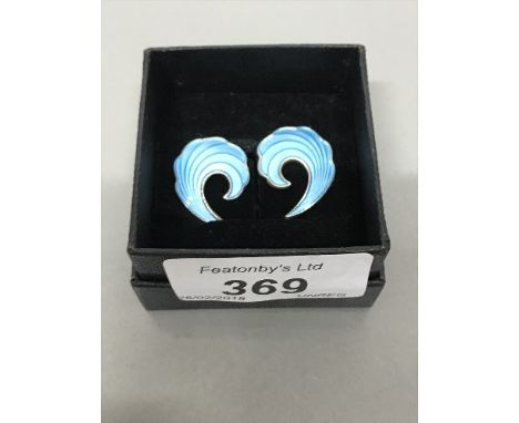 PAIR OF S.C.H. NORWAY SILVER & BLUE ENAMEL CLIP EARRINGS, SWIRLING FEATHER