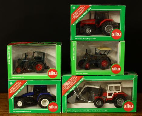 A collection of Siku 1:32 scale models, comprising 2652 New Holland Ford tractor, window boxed; 2654 Massey-Ferguson tractor,