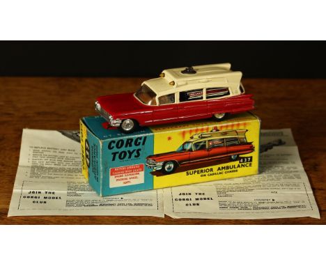 Corgi Toys 437 Superior Ambulance on Cadillac chassis with windows, red body with cream roof, roof light, boxed with two copi