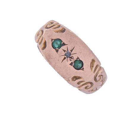 A diamond and green paste ring, gypsy set in 9ct gold, Birmingham 1918, 2.2g, size L  Light wear and early repair to hoop