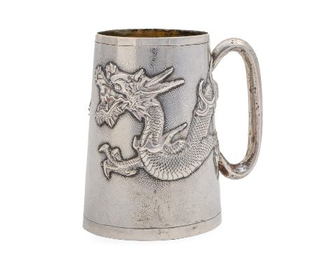 A Chinese silver mug, c1900, of stippled, tapered cylindrical shape and applied with a repousse dragon, 10.5cm h, marked WH 9
