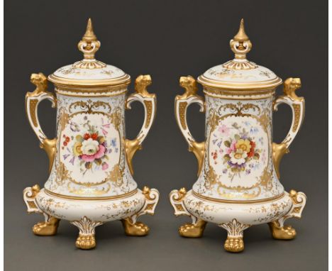 A pair of Coalport '200' shape vases and covers, c1910,&nbsp;painted by H P Hughes, both signed, with flowers in gilt cartouc