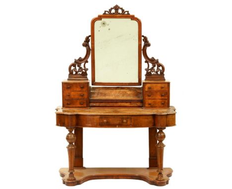 A Victorian walnut serpentine mirror back dressing table, 172cm h; 120 x 59cm  Minor chips and losses to veneer, one leg with