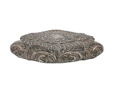 An Edwardian silver trinket box, the lid and sides die stamped with scrolls in gadrooned border, 16.5cm l, maker B &amp; Co, 