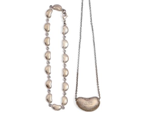 Tiffany &amp; Co. A silver bean pendant, necklet and bracelet designed by Elsa Peretti, bracelet 18cm l, maker's marks, 24g  