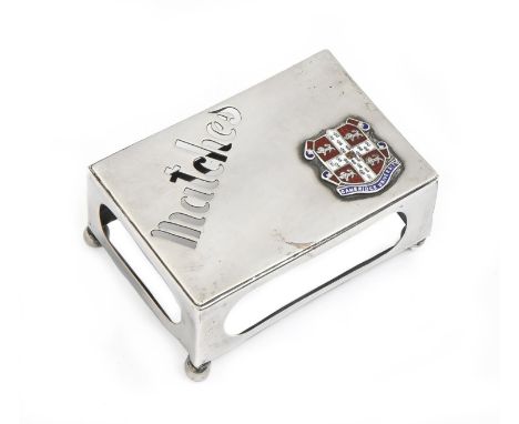 An Edwardian silver matchbox slide, applied with enamelled arms of the University of Cambridge, 78mm l, by Spurrier &amp; Co,