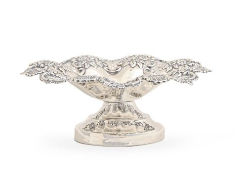 An Edwardian die stamped silver lobed and trellis pierced fruit stand, on moulded foot, 17.5cm diam, by William Hutton &amp; 