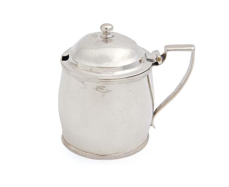A George III silver mustard pot, of plain barrel shape, with reeded rims and domed lid, blue glass liner, 85mm h, the undersi