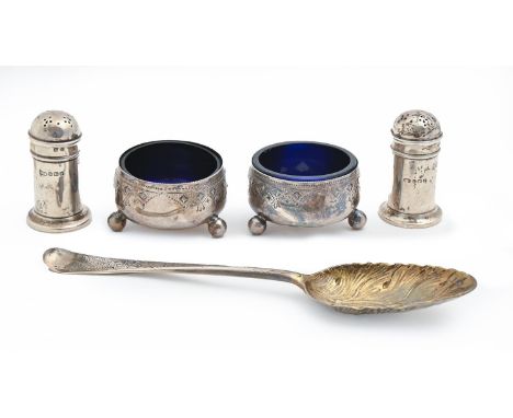 A pair of Victorian silver salt cellars, on three ball feet, blue glass liners, 57mm diam, by H Wilkinson &amp; Co, Sheffield