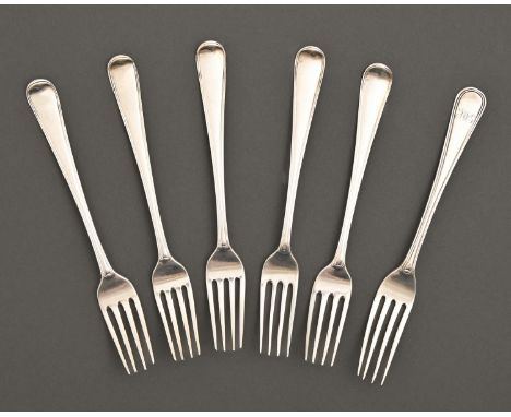 A set of five Irish George III silver dessert forks, Old English Thread pattern, crested, by John Power, Dublin 1790 and one 
