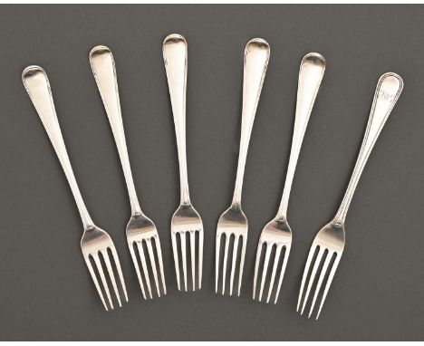 A set of five Irish George III silver dessert forks, Old English Thread pattern, crested, by John Power, Dublin 1790 and one 