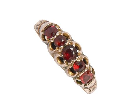 A garnet ring, in 9ct gold, Birmingham, date letter rubbed, c1900, 1.6g, size N  Light wear