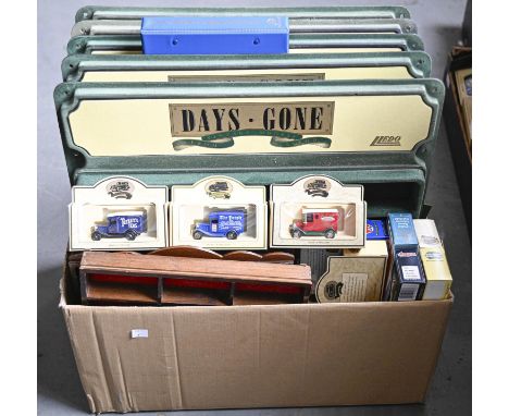 Diecast Vehicles.&nbsp; An extensive collection of boxed vintage cars, sports cars, public transport&nbsp; and delivery vans,